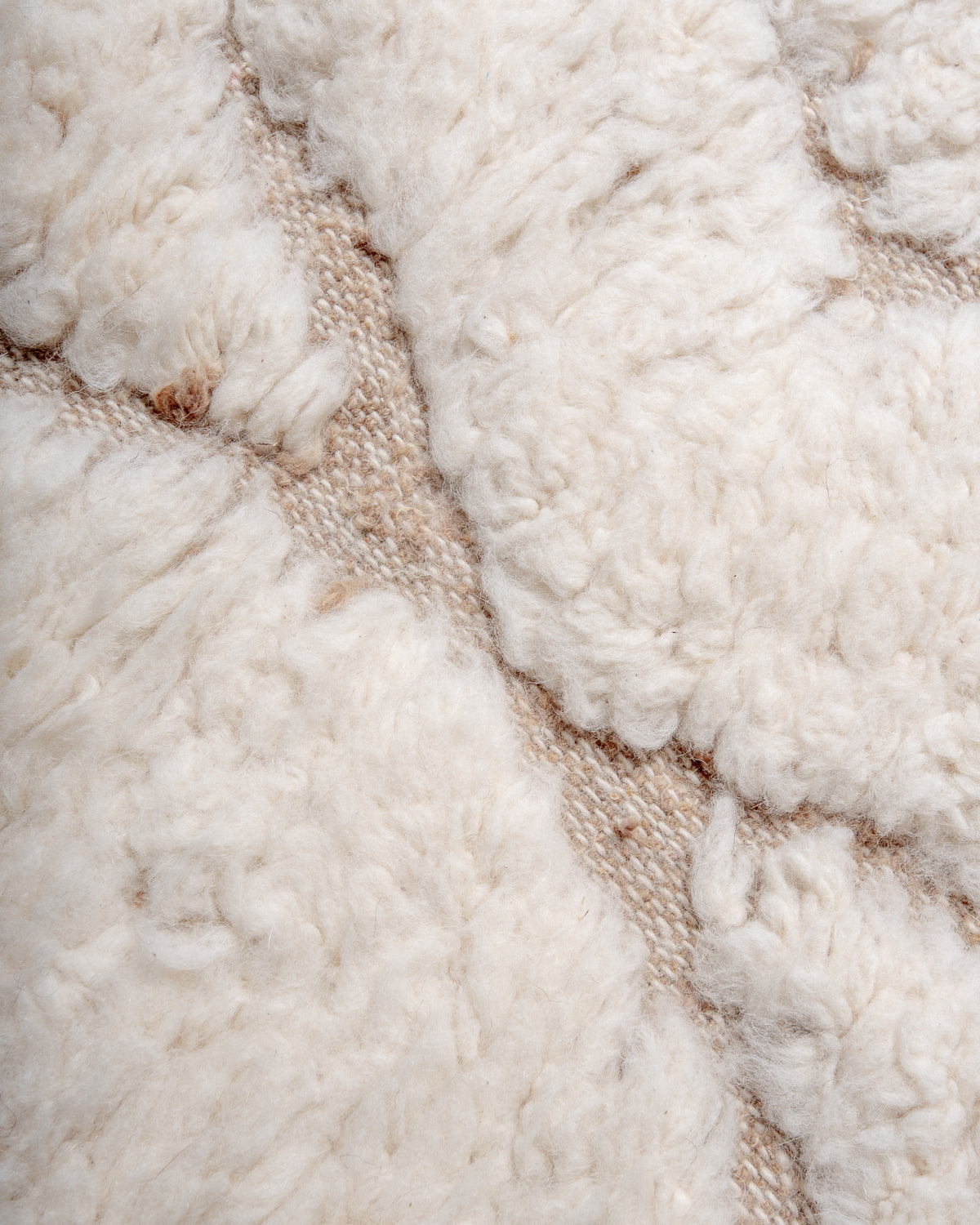 Modern, designer, handcrafted Berber rug from Morocco. Beniourain carpet with minimalist design, natural wool pile and a fluffy texture.